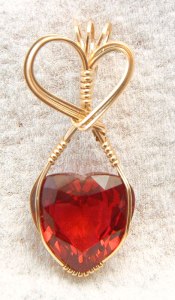 Synthetic Ruby heart in gold pendant